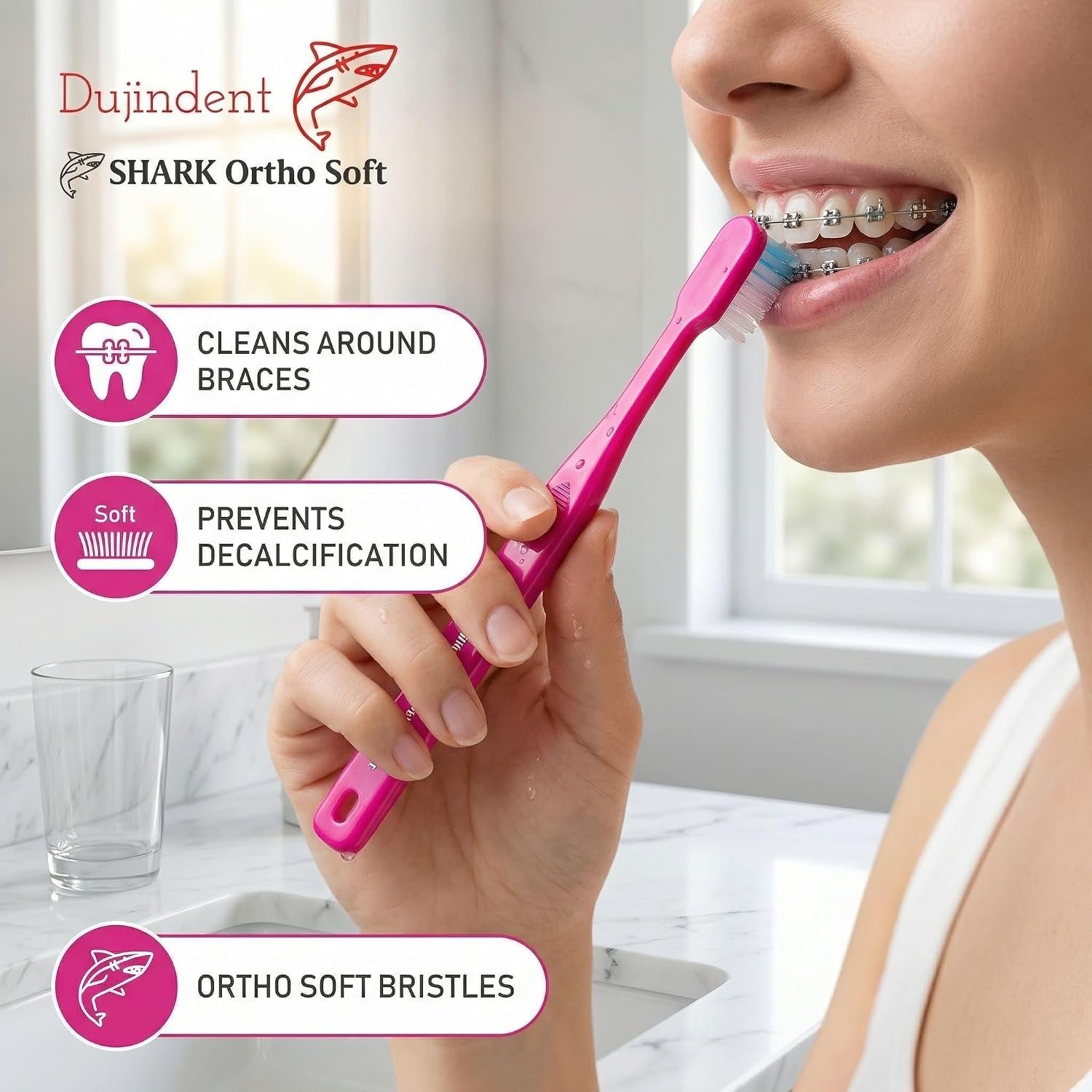 Cleaning around brackets with dujindent toothbrush for braces