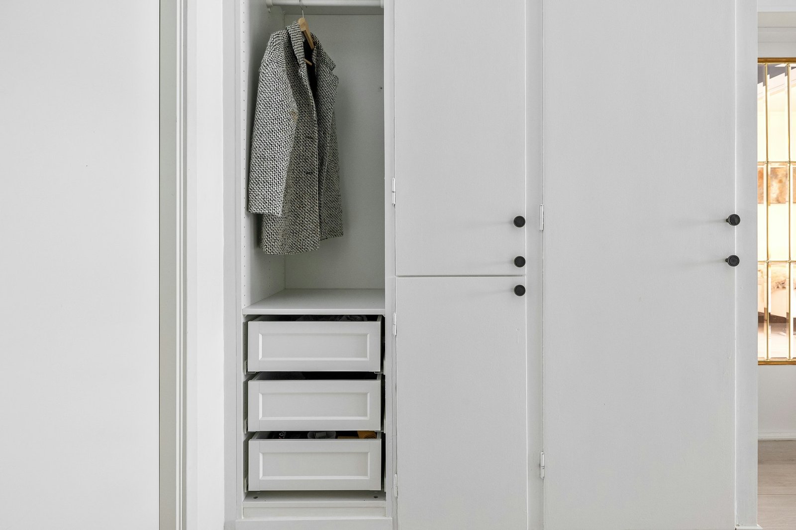 Organized closet with easy-to-reach everyday clothes