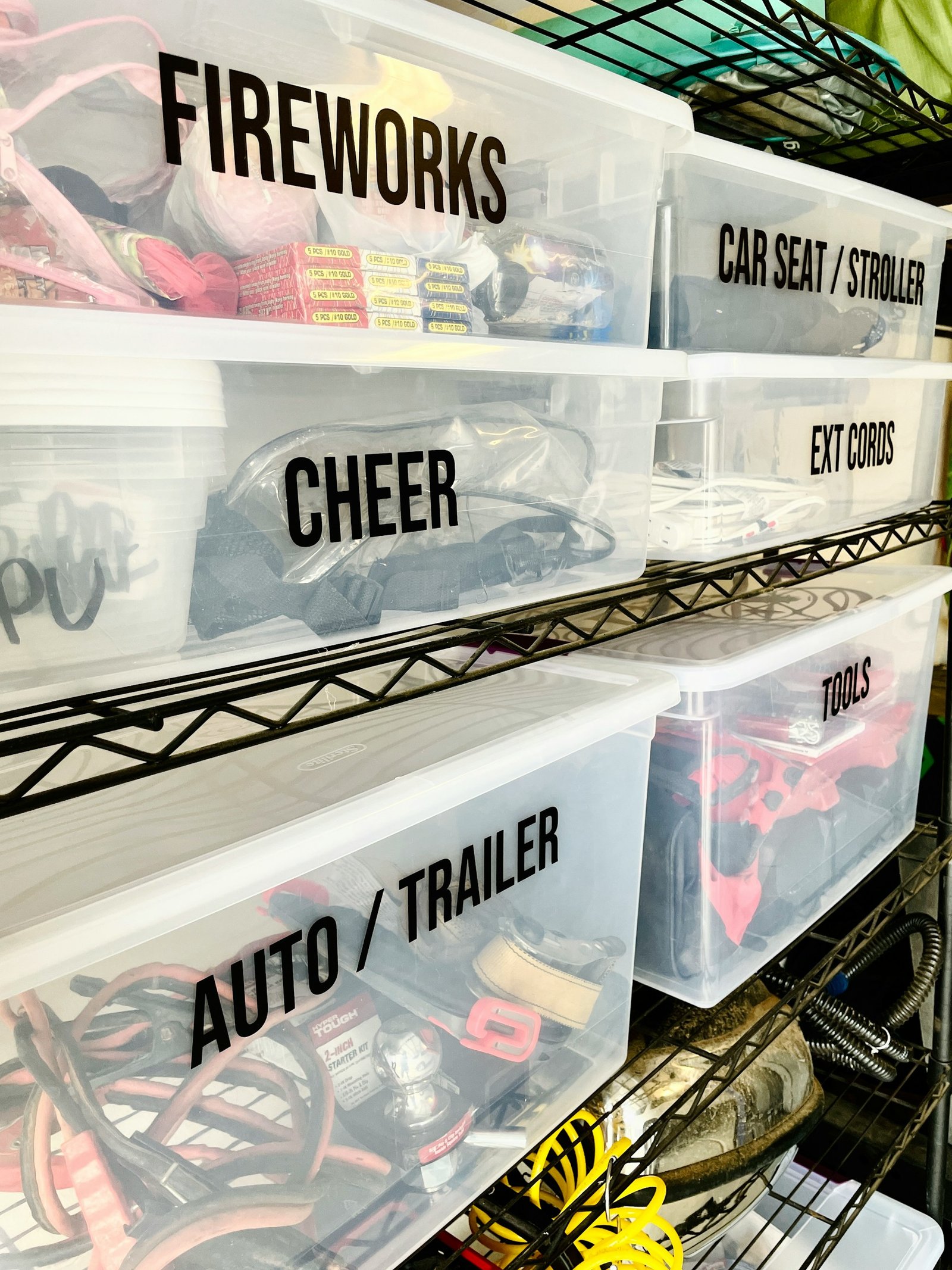 Labeled storage bins on shelves for organized storage