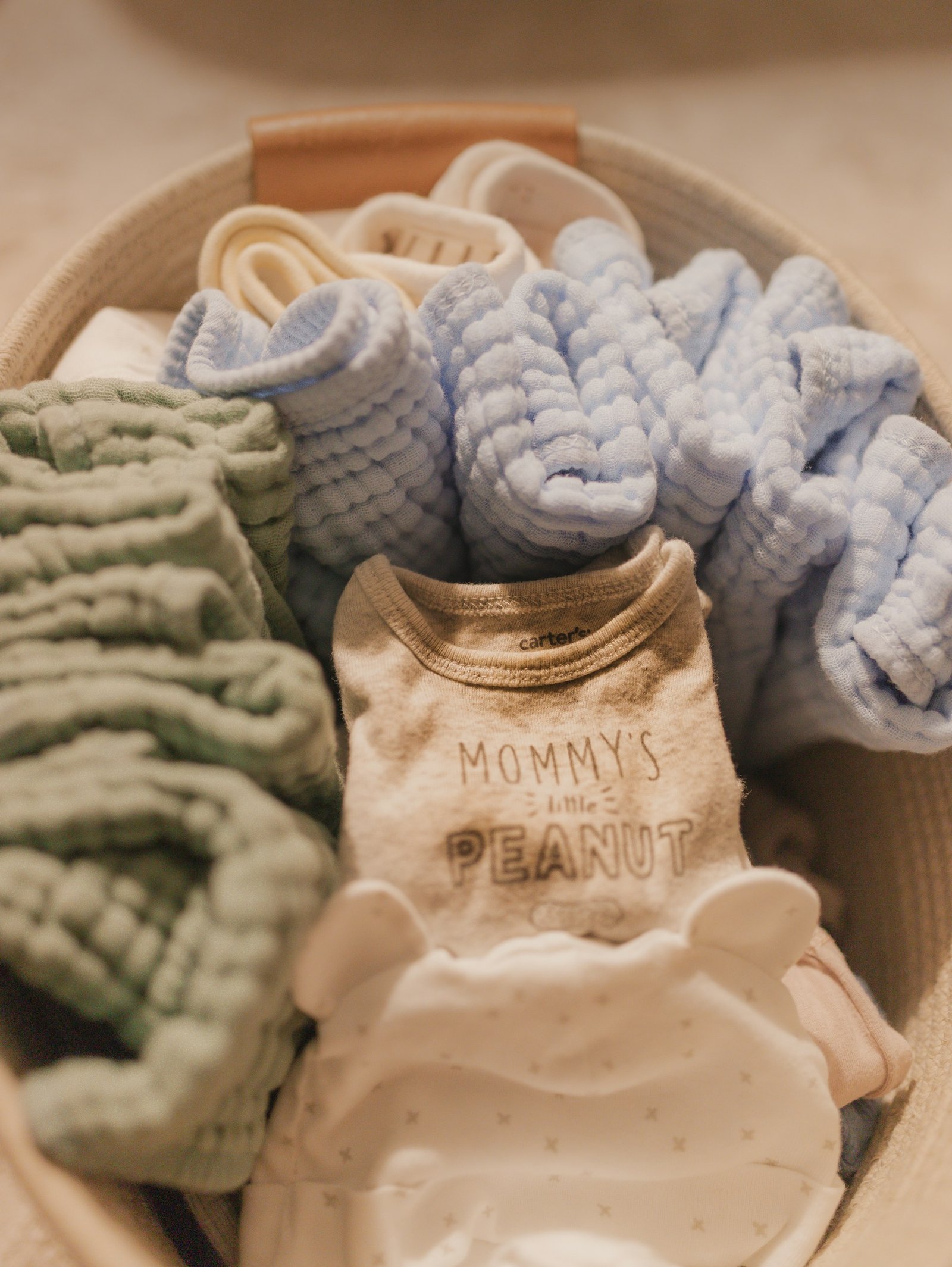 Kids clothes organized in storage baskets