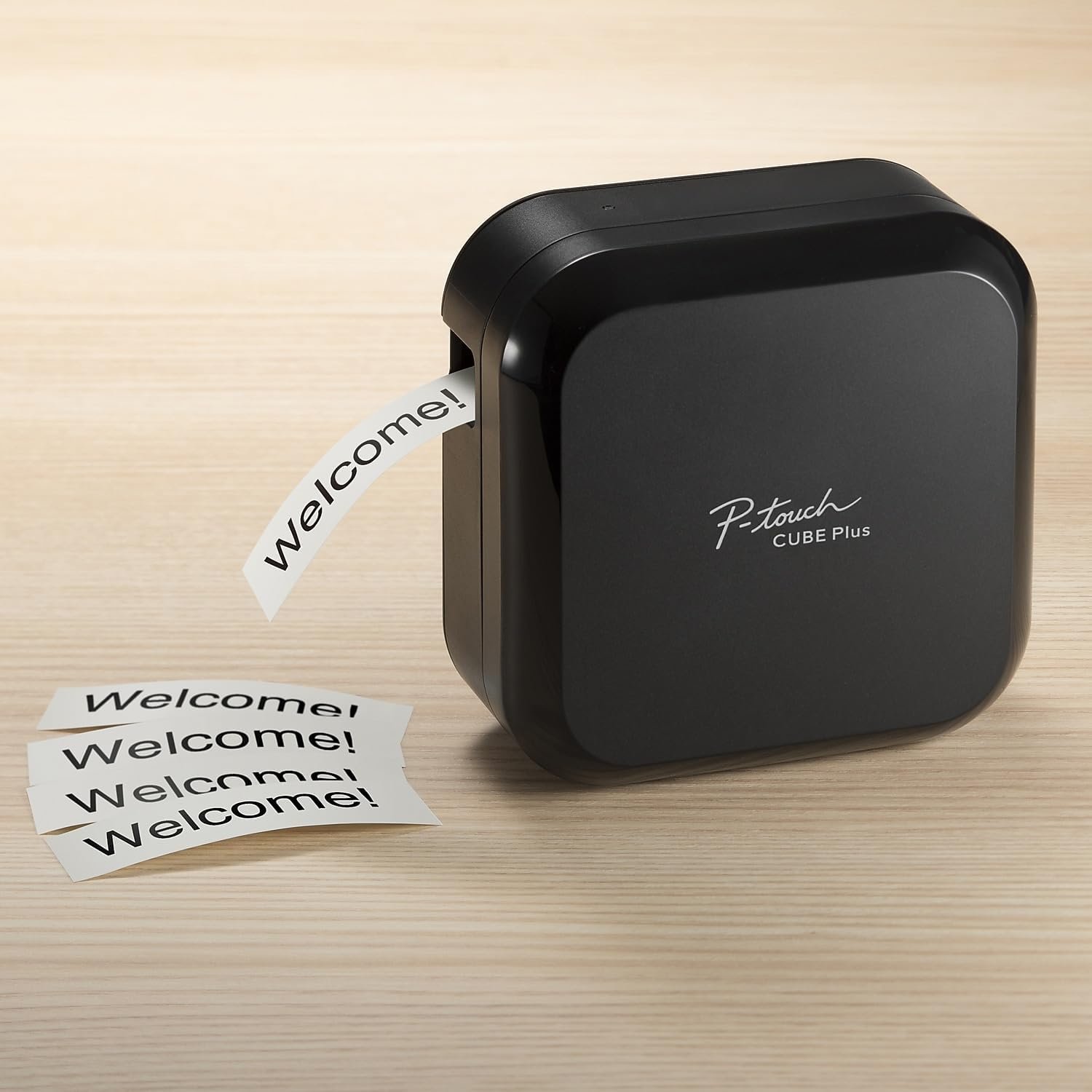 Brother P-touch CUBE Plus Bluetooth label maker printing a label