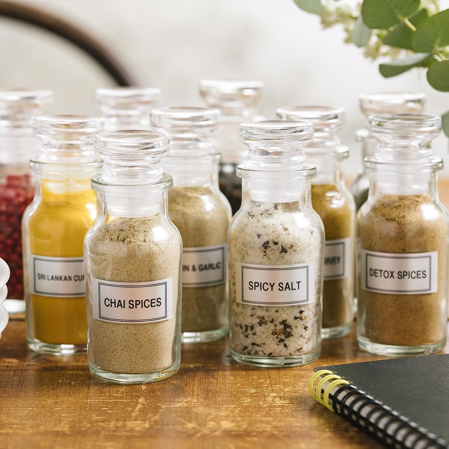 Pantry jars organized with labels using a Bluetooth label maker